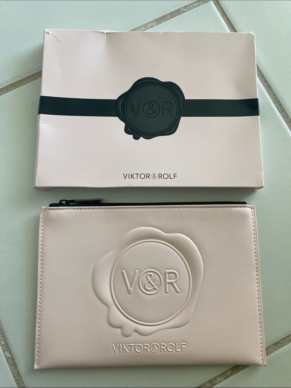 Viktor & Rolf Blush Pink Embossed V&R Zip Card Holder. Promotional item.
